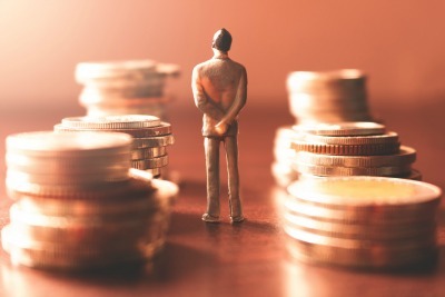 Miniature people looking future with stack coin about financial and money savings concept. Miniature people looking future with stack coin about financial and money savings concept.